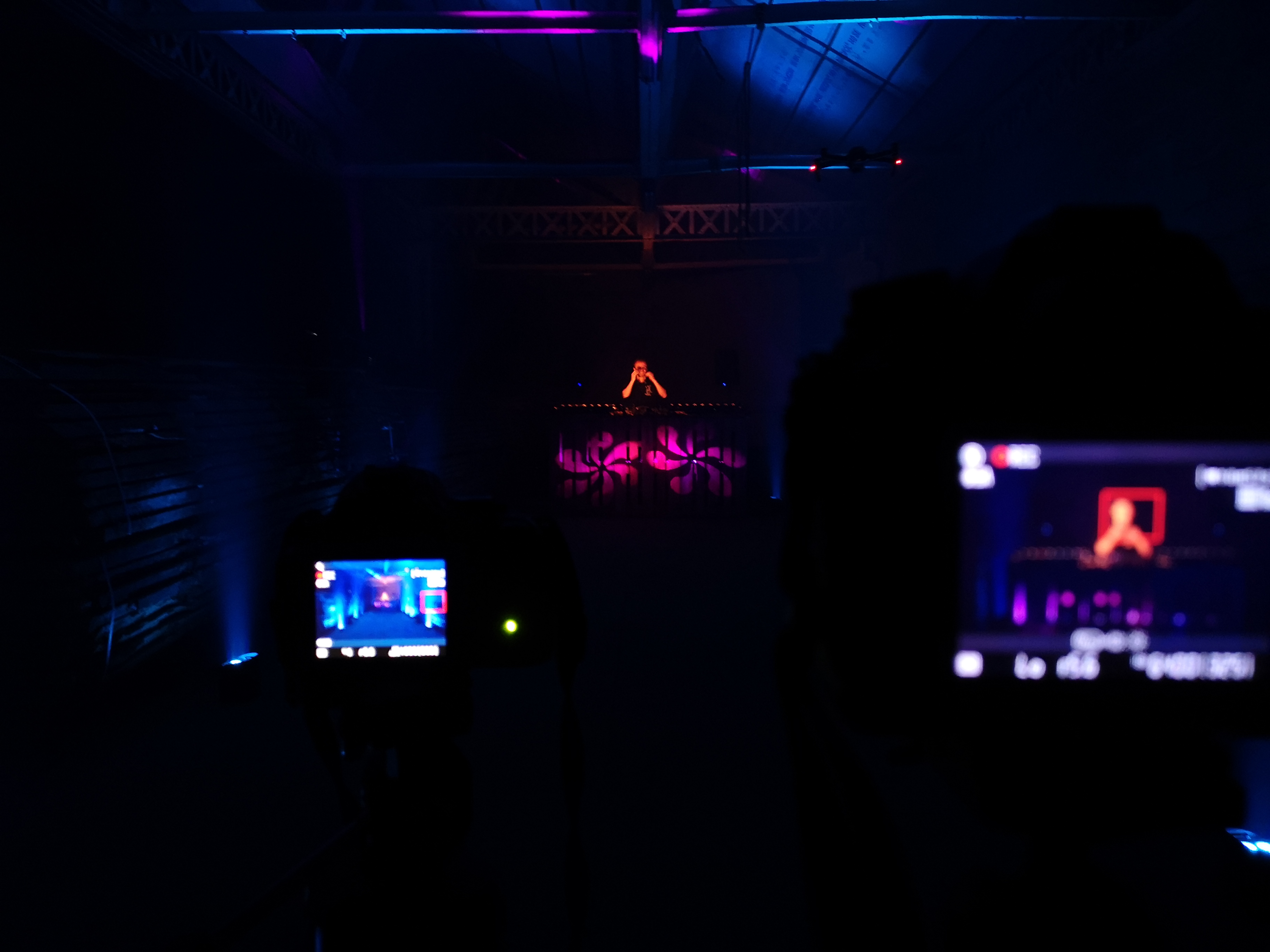 View from behind the cameras, blue and pink light